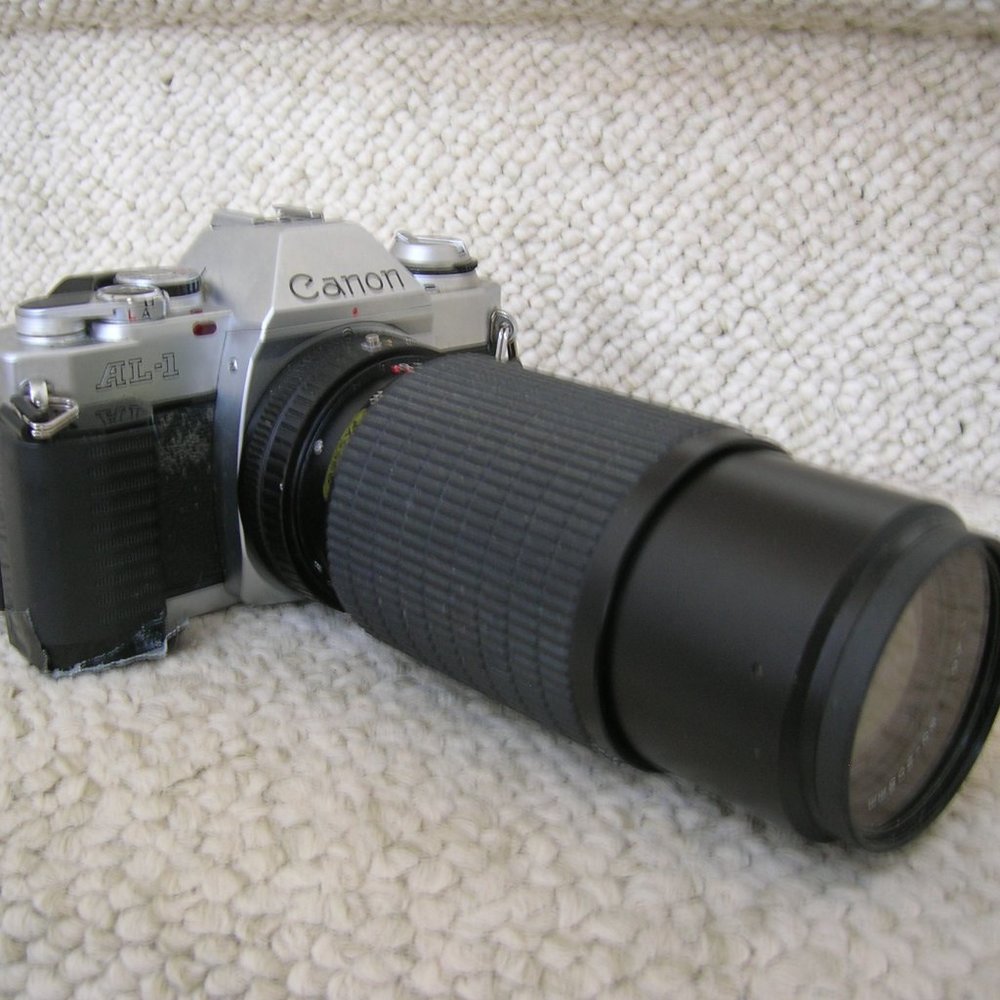 Canon SLR Vintage Camera and Zoom